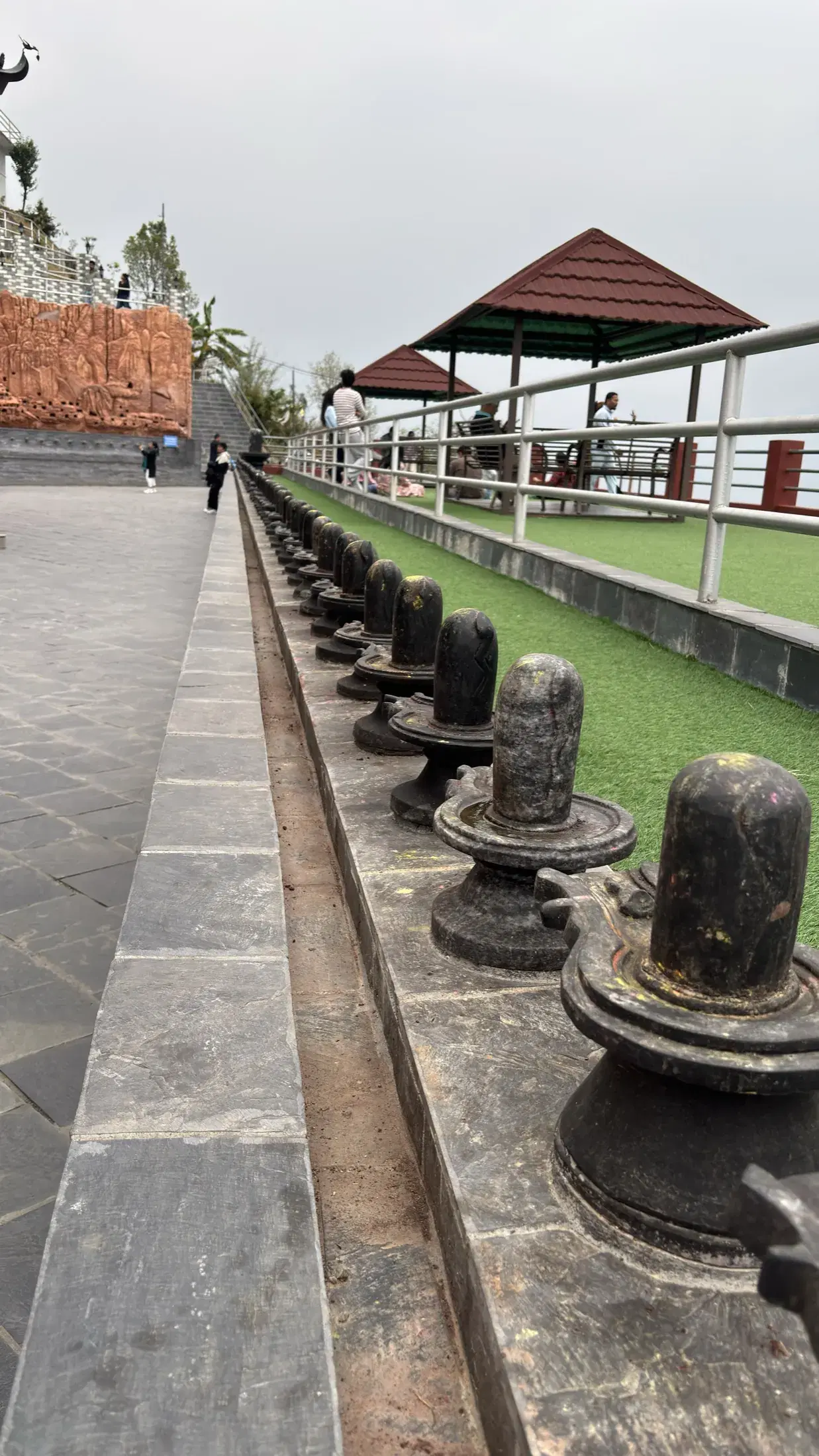 A long row of stone Shiva lingams at the Pumdikot temple complex