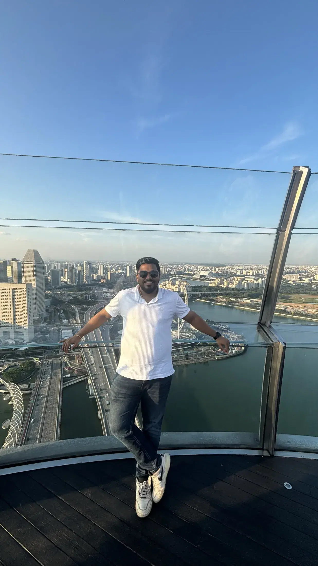 Manish at the Sands SkyPark overlooking central Singapore and Marina Bay